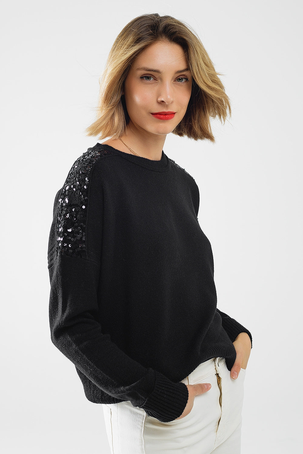 Q2 Black long sleeves sweater with sequins on the shoulders