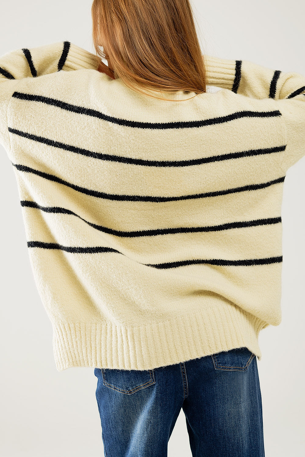 Oversized Cream Sweater with Black Stripes