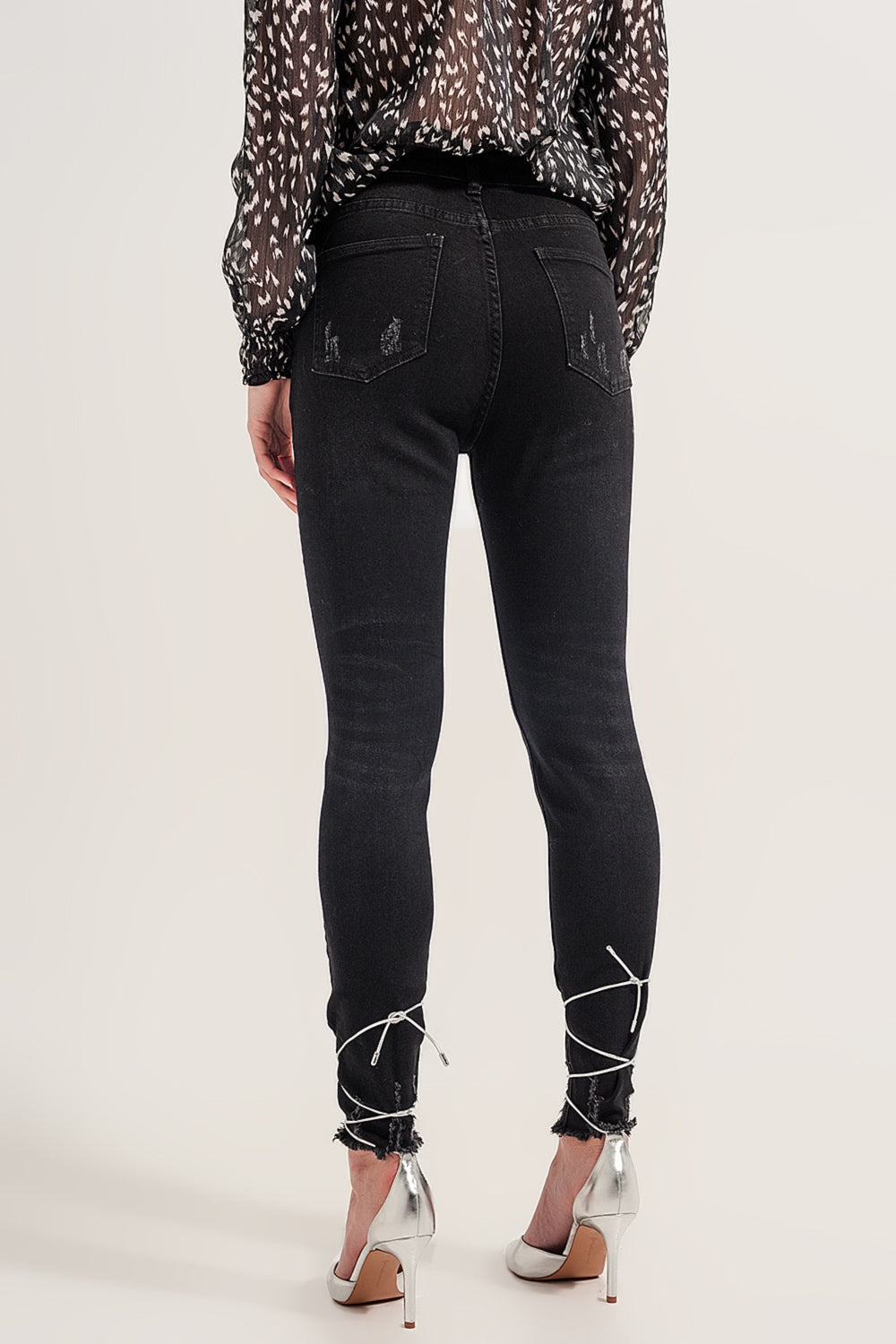 Raw Hem Skinny Jeans in Washed Black